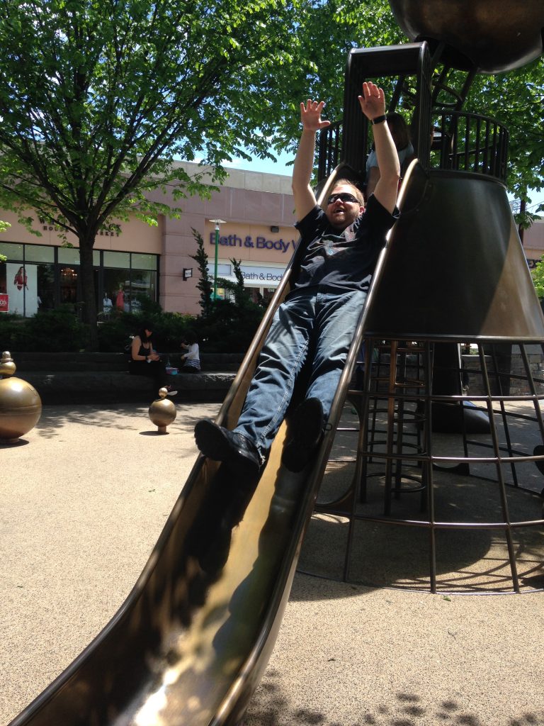 Grown Man Popping Out of Slide